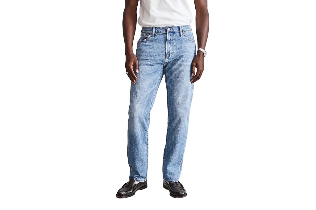 A man wearing blue jeans